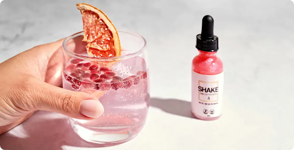 Pink lemonade and edible glitter drops for a princess party